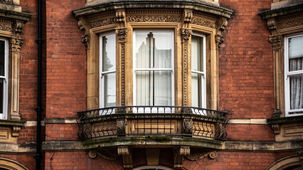 Beautiful Victorian bay window with ornate stonework and period architectural features